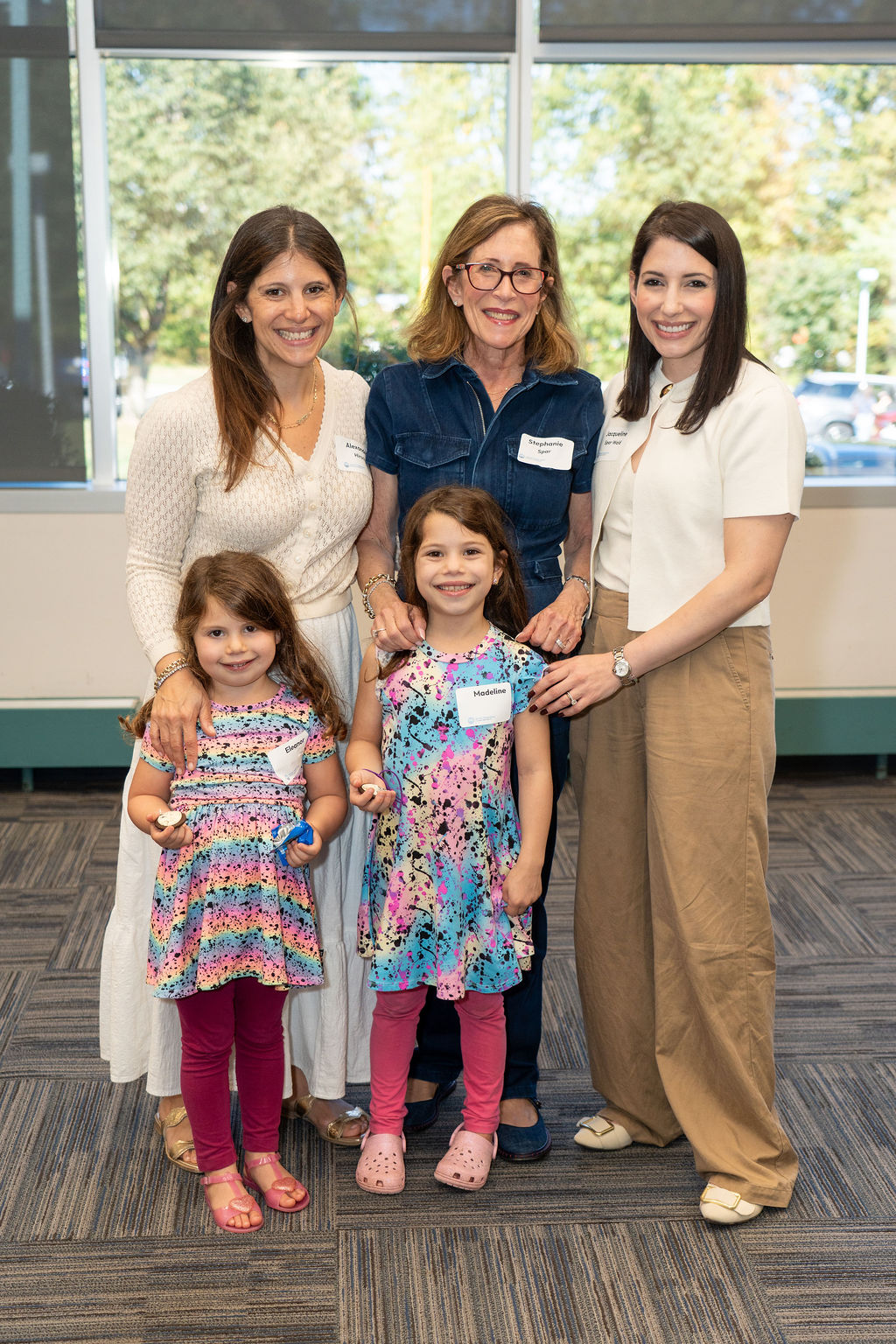 A family standing together at a NextGen event.