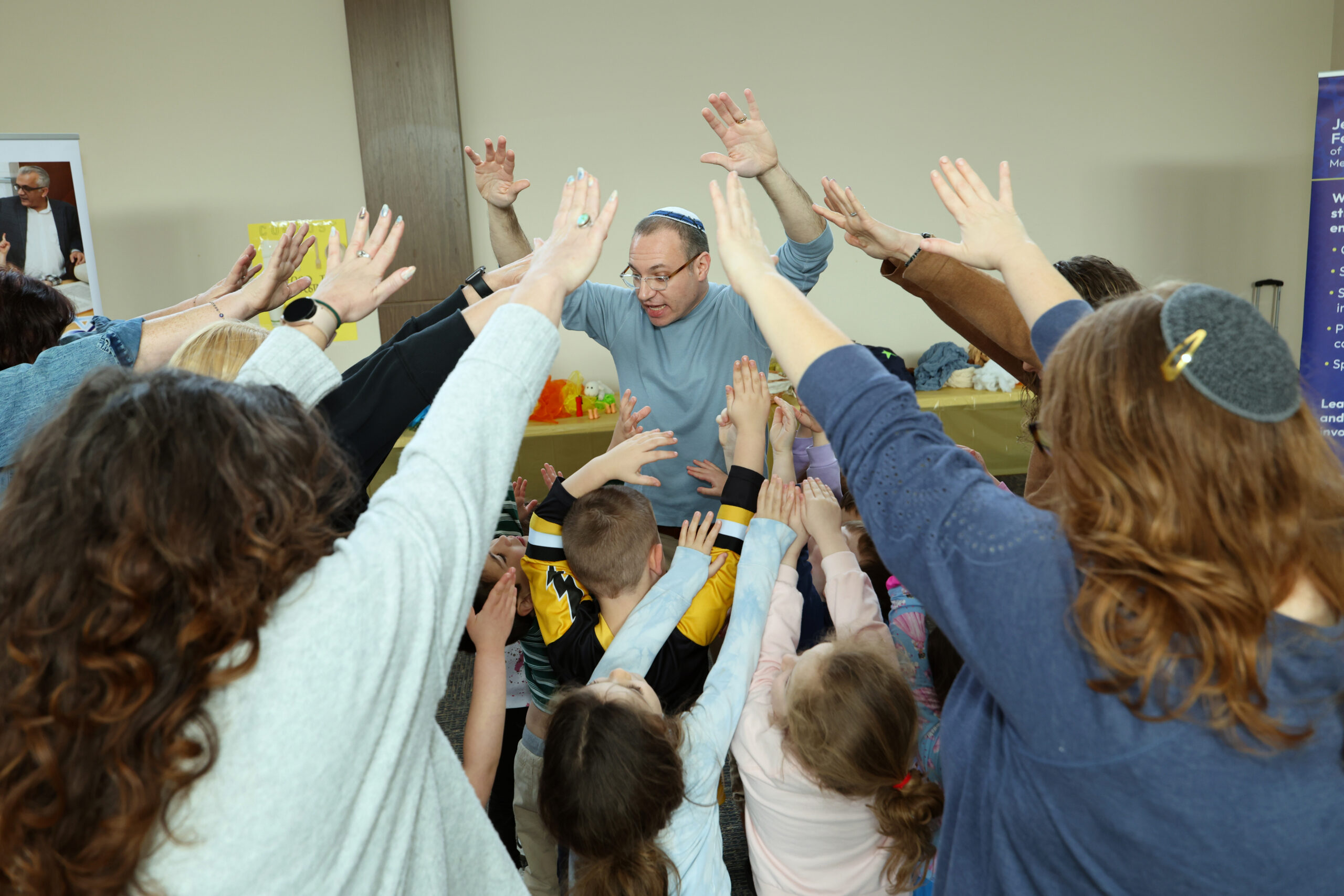 Jonathan Chapman leads children in Let There Be Play