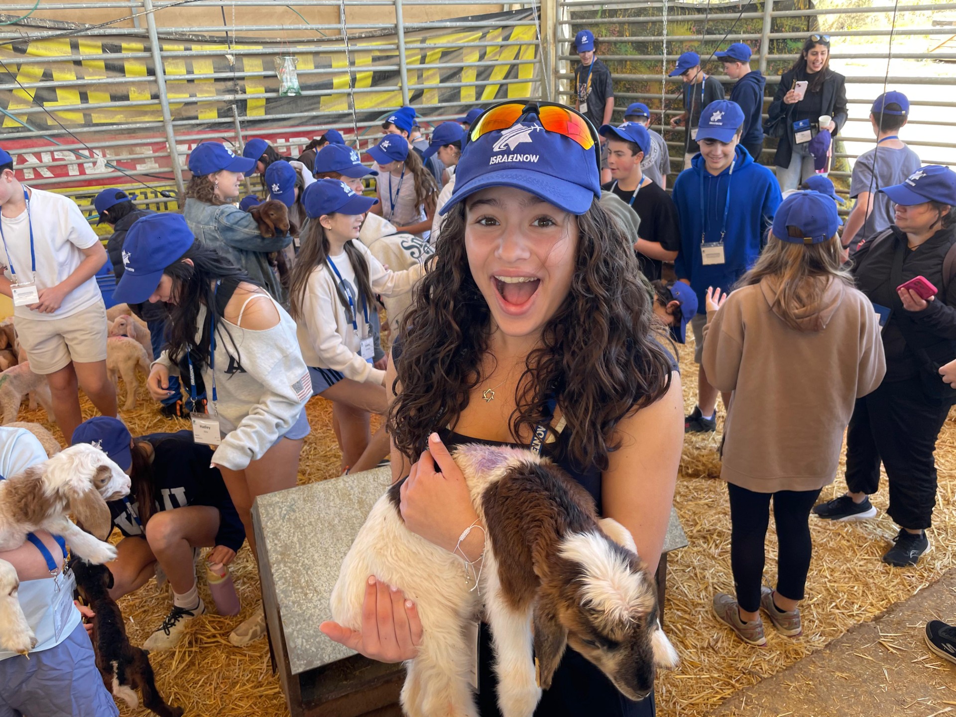 Dylan Baker, and 8th-grader holding a goat while on Federation's recent IsraelNow trip, a pluralistic Jewish program exploring Israel.